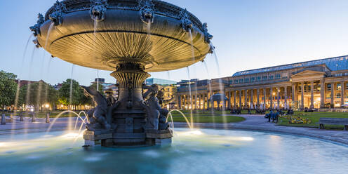 Palace square with fountain in front of Koenigsbau at dusk, Stuttgart, Germany - WDF05274