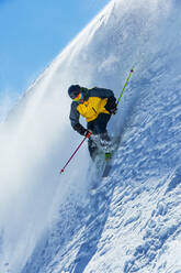 Skier moving down slopes, Saas-Fee, Valais, Switzerland - CUF51550