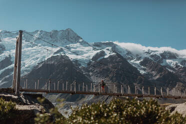 Hiker exploring wilderness, Wanaka, Taranaki, New Zealand - ISF21845