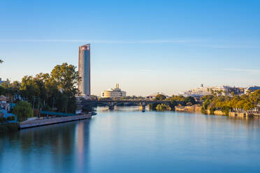 Long exposure of Torre Sevilla and bridge crossing the Canal de Alfonso XIII, Seville, Spain - TAMF01589