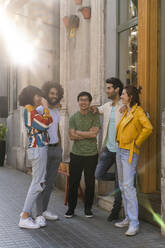 Happy group of friends talking in the city - AFVF03502