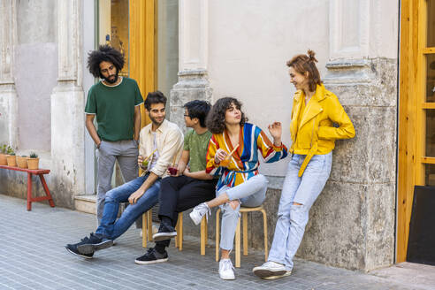 Group of friends having a break in the city - AFVF03511