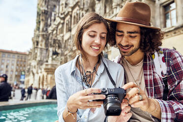 Young couple taking a photo - SUF00581