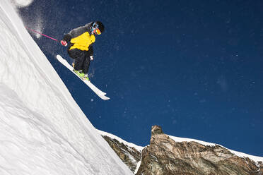 Skier moving down slopes, Saas-Fee, Valais, Switzerland - CUF51760