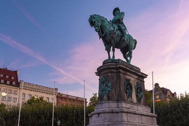 Low angle view of Charles X Gustav statue against sky during sunset, Malmo, Sweden - TAMF01658
