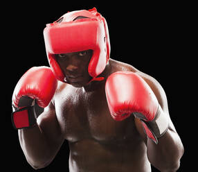 African American boxer in protective gear - BLEF07874
