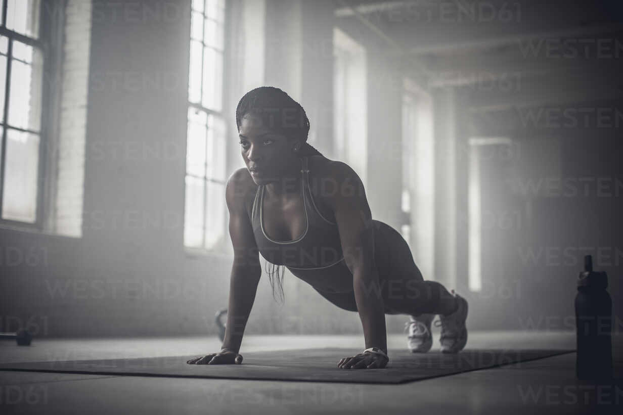 Black Woman doing Push Ups - Dano Milk Nigeria