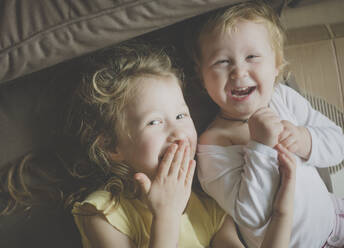 Two little sisters having fun together - IHF00163