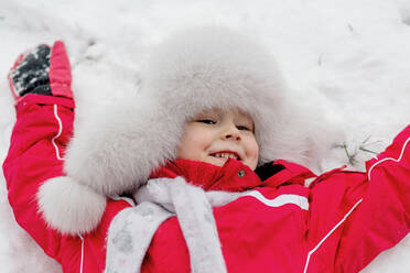 Das Kind liegt frohlich im Schnee - OGF00017