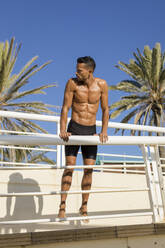 Sporty barechested man on the promenade - MAUF02672
