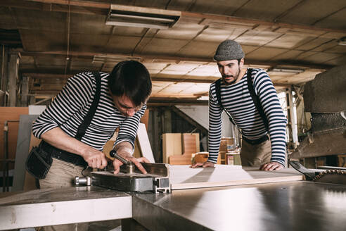 Carpenters at work on a saw - VPIF01317