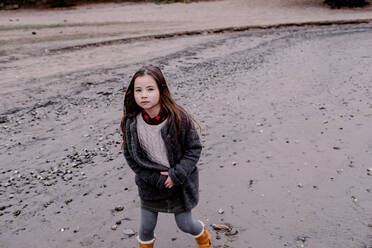 Portrait of little girl at riverside in autumn - OGF00045