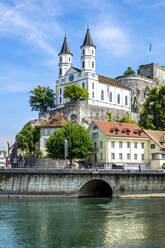 Church and fortress by Aare River in Aarburg against sky - PUF01683