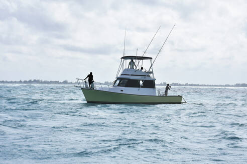 Fishing boat on choppy ocean, Grand Cayman Island, Cayman Islands - FSIF04061