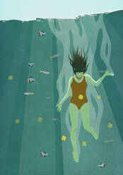 Frau taucht ins Meer, umgeben von Fischen - FSIF04080