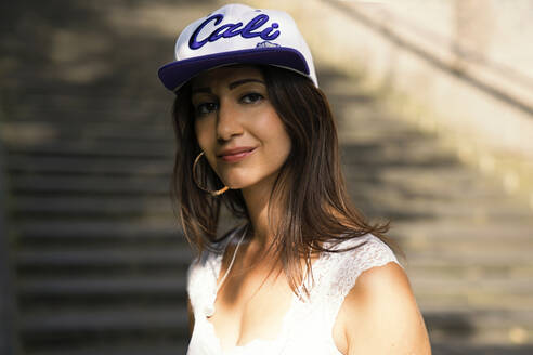 Portrait of young woman with baseball cap - TWOF00017