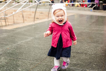 Caucasian girl laughing at park - BLEF10264