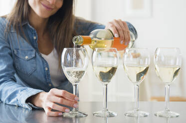 Businesswoman drinking from large wine glass with straw stock photo  (213501) - YouWorkForThem