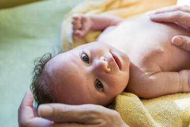 Caucasian newborn laying on towel - BLEF10902