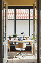 Empty chair in home study - BLEF11303