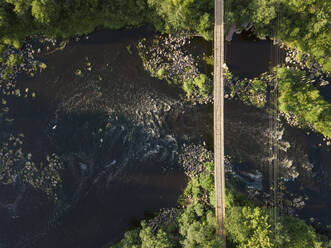 Suspension bridge over Tikhvinka river, Tikhvin, Russia - KNTF02926