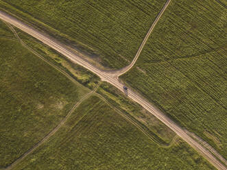 Aerial view of car at a dirt track, Tikhvin, Russia - KNTF02930