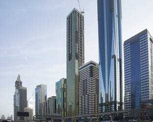 Highrise buildings in Dubai cityscape, Dubai Emirate, United Arab Emirates - BLEF11988
