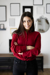 Portrait of confident young businesswoman at home - GIOF06977