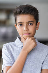 Portrait of a confident boy at home - DIGF07778