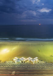 Aerial view of market on beach under cloudy sky - BLEF12735