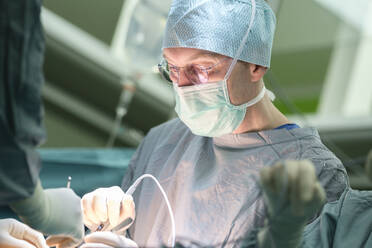 Surgeon during surgery - MWEF00202