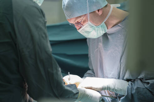 Surgeon during surgery - MWEF00207