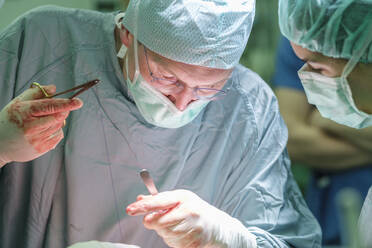 Surgeon during surgery - MWEF00209