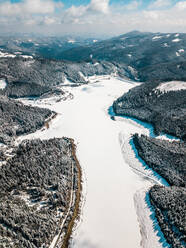 Aerial view of mountains against sky during winter, Carinthia, Austria - DAWF00893