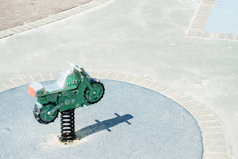 High angle view of toy motorcycle at playground stock photo