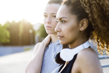 Portrait of two confident sporty young women - JSRF00495