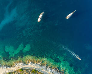 Aerial view of boats anchored next to Kastos island, Greece. - AAEF00249