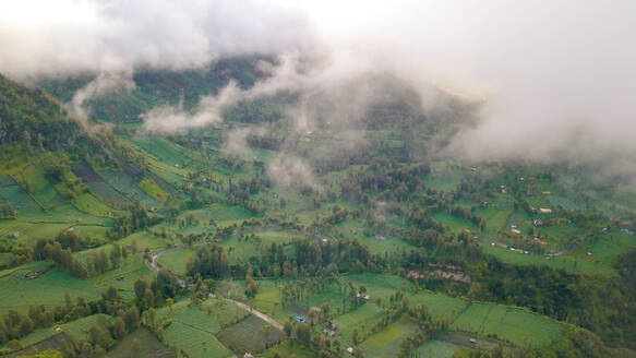 Aerial view of Seruni Point on a foggy morning in East of Java Island, Indonesia. - AAEF00333
