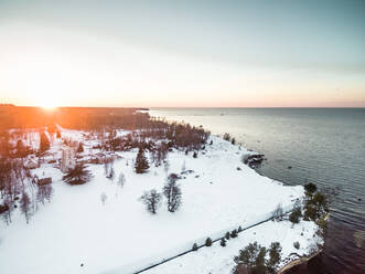 Aerial view of the snow coast at sunset in Estonia. - AAEF00900