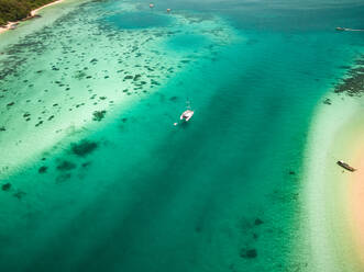 Aerial view of boats moored in the bay of Koh Rok Yai island in Thailand. - AAEF01050