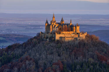 Hohenzollern Castle on top of mountain against sky, Germany - RUEF02311