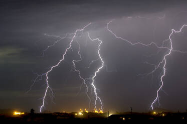 Multiple lightning bolts striking a power plant in Arlington during the 2016 monsoon season, Arizona, United States of America, North America - RHPLF00168