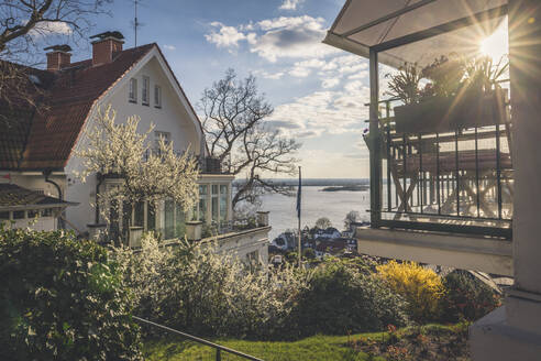 Houses by at Blankenese against sky during sunset at Hamburg, Germany - KEBF01303