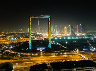 Aerial view of the illuminated Dubai Frame at night, U.A.E. - AAEF01118