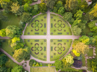 Aerial view above Abbey Gardens in Bury St Edmunds city, UK. - AAEF01182