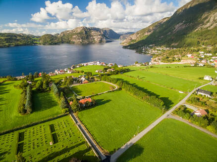 Aerial view of small coastal village during sunset, Forsand, Norway - AAEF01209