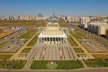 Aerial view of Kazakh National Academy of Choreography, Nur Sultan, Kazakhstan. With the Botanical Gardens and the ever changing skyline of the newly named Nur Sultan. - AAEF01353