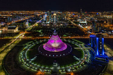 Aerial view of Entertainment Centre at Night, Nur Sultan, Kazakhstan. An image taken from the start of a hyoerlapse. Previously Astana is so beautiful at night. - AAEF01365