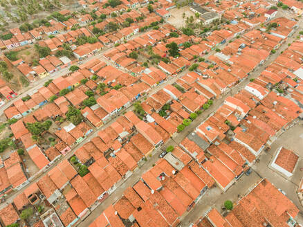 Aerial view of rooftops and small streets of Rio do Fogo town in Brazil. - AAEF01486