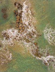 Aerial view of rocky sea in Cajueiro, Brazil. - AAEF01491